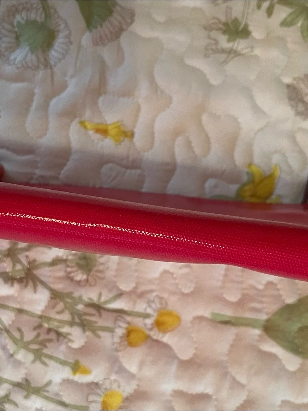 kate spade red travel pouch with gold logo plate